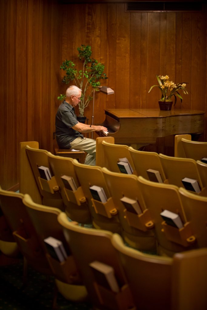 a man playing a piano