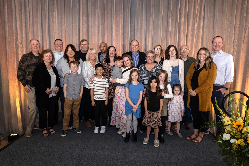 Joe Watkin's family gathers for a photo during the Homecoming awardee ceremony. 