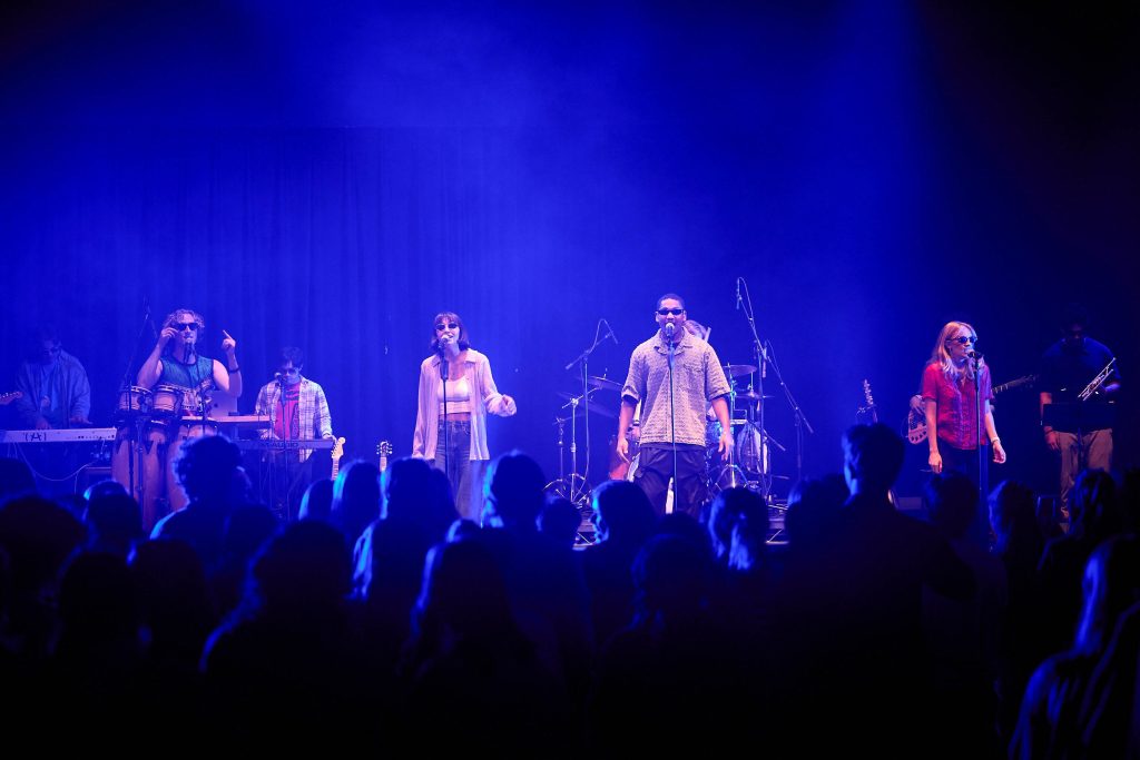 A PLNU student band jams at a fun concert.